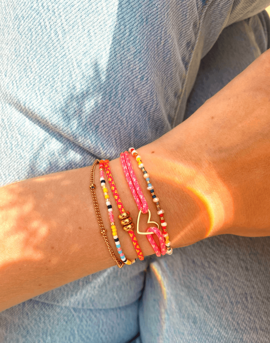 Nylon armband basic open hartje - goud - Bytrend.nl